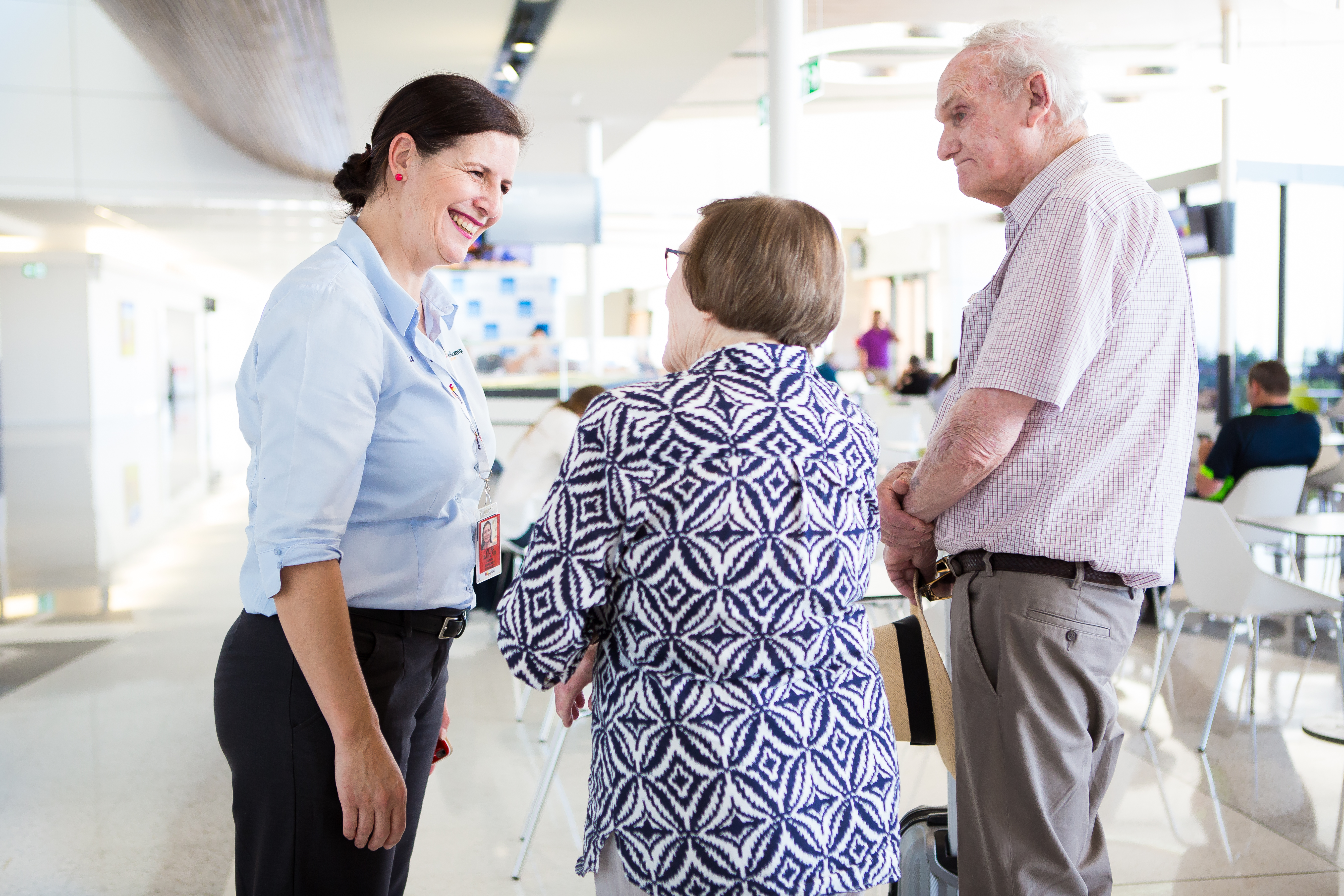 Airport Employee greeting an elderly couple at Toowoomba Wellcamp Airport | www.wellcamp.com.au