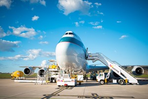 A Cathay Pacific Airways Boeing 747-8F on the apron at Toowoomba Wellcamp Airport with ground support equipment servicing the aircraft during offloading of cargo | www.wellcamp.com.au