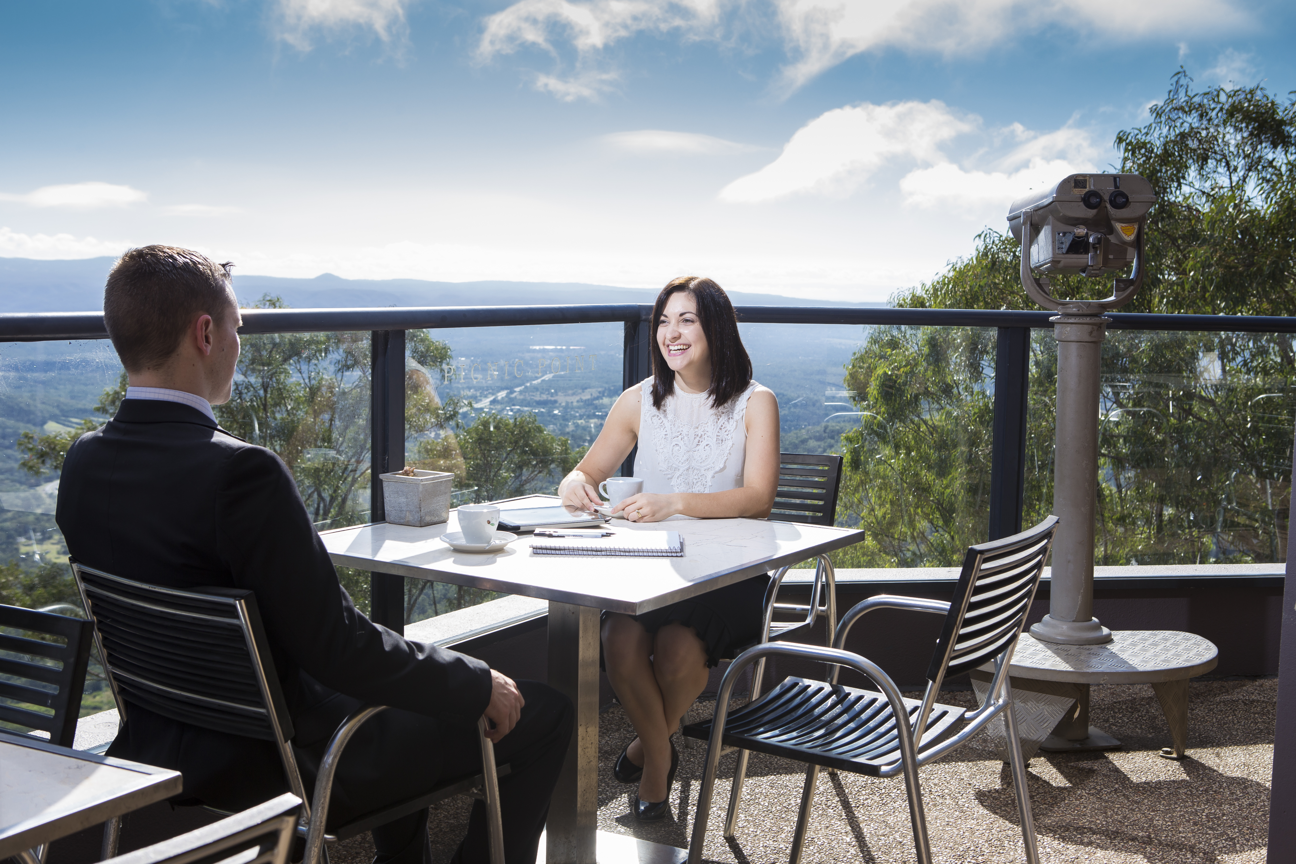 Business executives enjoying a lunch overlooking Picnic Point in Toowoomba | www.wellcamp.com.au 
