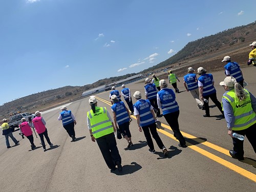 Wellcamp Airport Ambassadors undertaking the runway FOD walk as part of Airport Safety Week